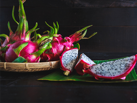 Dragon fruit cut and whole