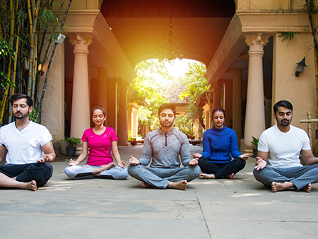  People meditating or performing yoga
