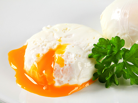 Poached egg with the yolk oozing out